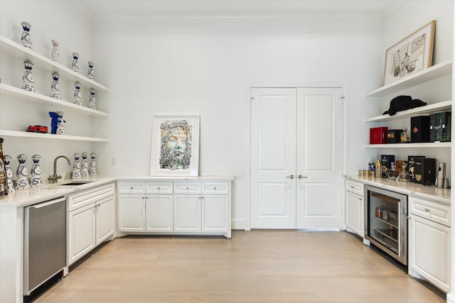 4613 Maple St, Bellaire, TX 77401 - indoor dry bar featuring beverage cooler, dishwasher, light wood-type flooring, and ornamental molding