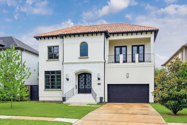 4613 Maple St, Bellaire, TX 77401 - mediterranean / spanish-style home featuring a balcony, a tiled roof, an attached garage, stucco siding, and concrete driveway