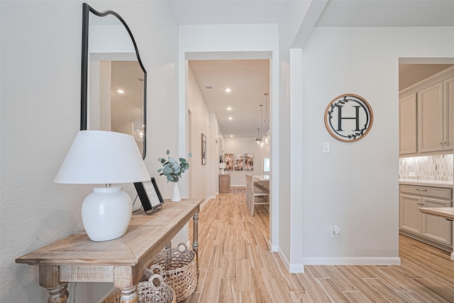 19443 Pacers Gait Ln, Tomball, TX 77377 - hall with light wood-style floors, recessed lighting, and baseboards