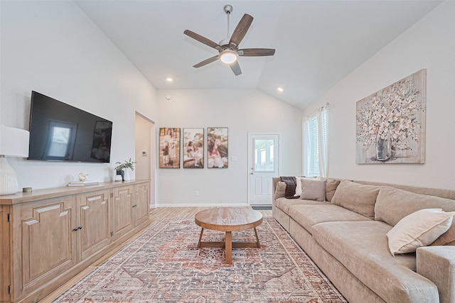 19443 Pacers Gait Ln, Tomball, TX 77377 - living room featuring vaulted ceiling, a ceiling fan, recessed lighting, light wood-style floors, and baseboards
