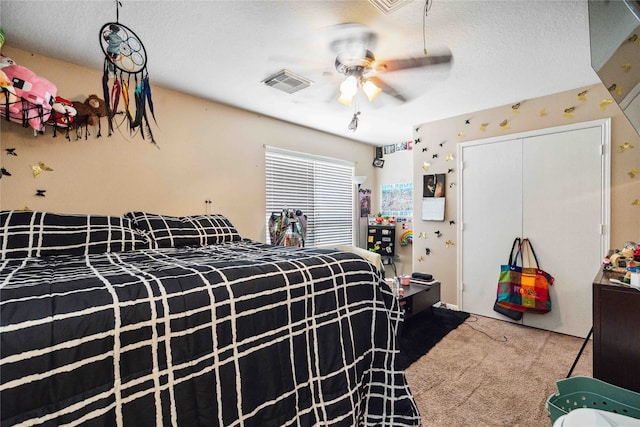 24235 Stargazer Pt, Spring, TX 77373 - bedroom with carpet floors, a textured ceiling, a closet, and ceiling fan