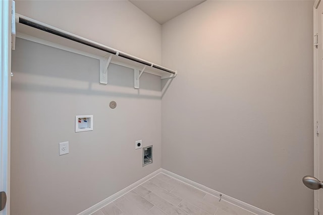 27335 Axis Deer Trl, Magnolia, TX 77354 - laundry area featuring hookup for an electric dryer, hookup for a washing machine, baseboards, and gas dryer hookup