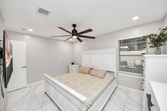 8707 Tartan Walk Ln, Houston, TX 77075 - bedroom with light marble finish floors, recessed lighting, baseboards, and a ceiling fan