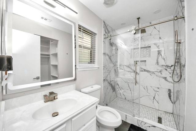 8707 Tartan Walk Ln, Houston, TX 77075 - bathroom with toilet, a marble finish shower, and vanity