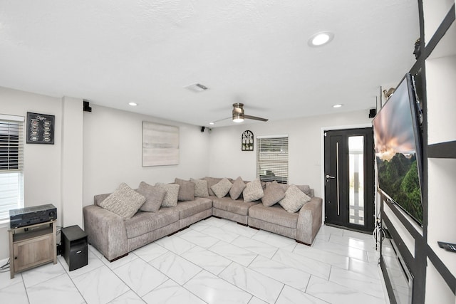 8707 Tartan Walk Ln, Houston, TX 77075 - living area with ceiling fan and recessed lighting
