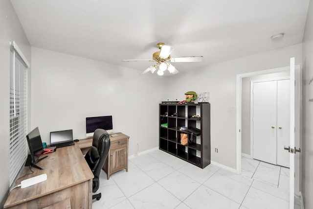 8707 Tartan Walk Ln, Houston, TX 77075 - home office with a ceiling fan, baseboards, and light marble finish floors