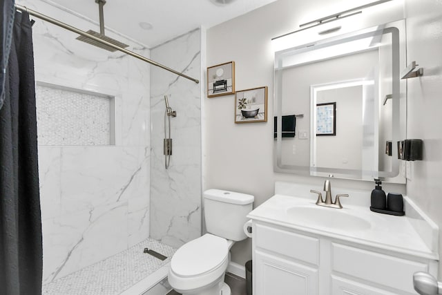 8707 Tartan Walk Ln, Houston, TX 77075 - bathroom featuring vanity, toilet, and a marble finish shower