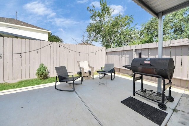 8707 Tartan Walk Ln, Houston, TX 77075 - fenced backyard with a patio and area for grilling