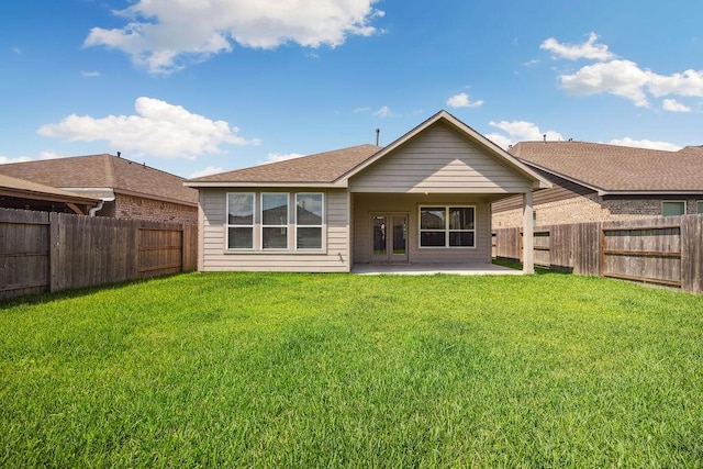 15210 Monal Trie Dr, Humble, TX 77346 - back of house featuring a patio area and a shingled roof