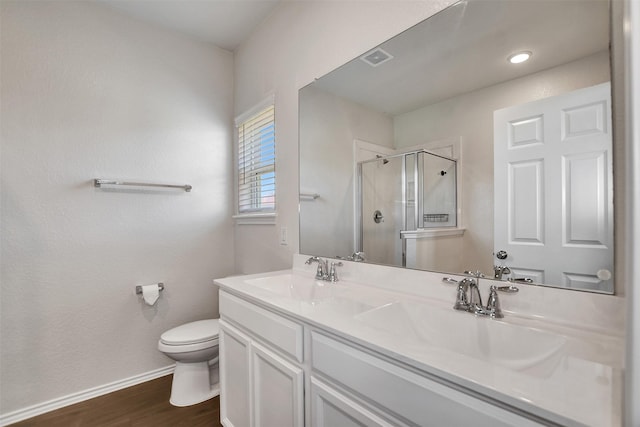 25919 Llano Knoll Ln, Katy, TX 77493 - full bath with toilet, a stall shower, wood finished floors, baseboards, and double vanity