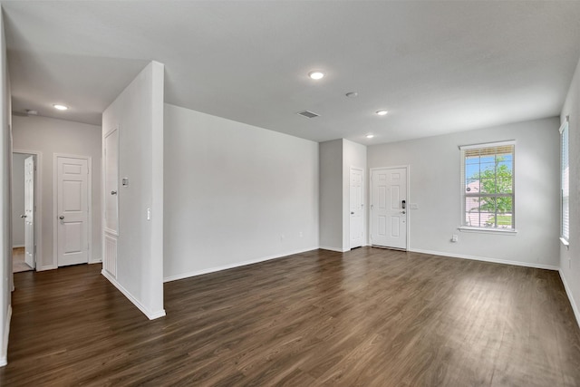 25919 Llano Knoll Ln, Katy, TX 77493 - empty room with dark wood-style flooring, recessed lighting, and baseboards