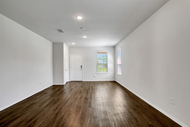 25919 Llano Knoll Ln, Katy, TX 77493 - spare room with dark wood-type flooring, baseboards, and recessed lighting