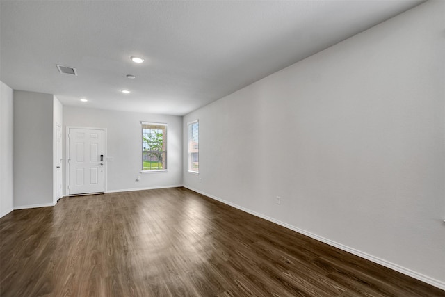 25919 Llano Knoll Ln, Katy, TX 77493 - spare room featuring dark wood-type flooring, baseboards, and recessed lighting