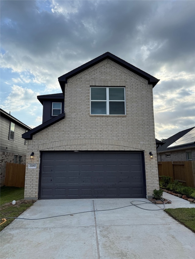 27318 Axis Deer Trl, Magnolia, TX 77354 - traditional home with brick siding, driveway, and a garage