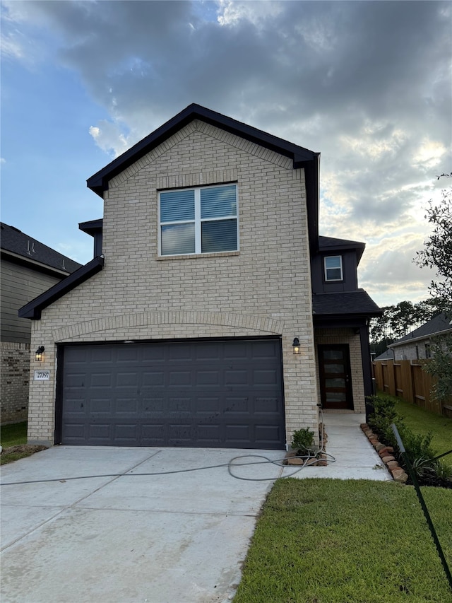 27318 Axis Deer Trl, Magnolia, TX 77354 - view of front of house featuring brick siding, an attached garage, and driveway