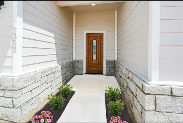 2352 Cedar Place Dr, Conroe, TX 77306 - property entrance with stone siding