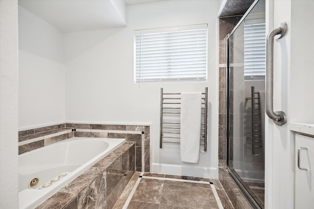 4521 Palmetto St, Bellaire, TX 77401 - full bath featuring a garden tub, a towel warmer, a shower stall, and radiator