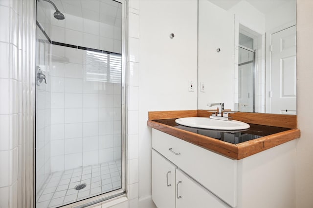 4521 Palmetto St, Bellaire, TX 77401 - bathroom featuring a shower stall and vanity