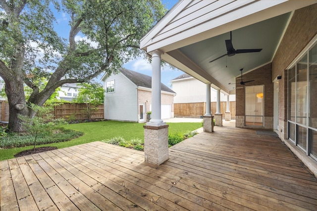 4521 Palmetto St, Bellaire, TX 77401 - wooden deck featuring ceiling fan and an outdoor structure