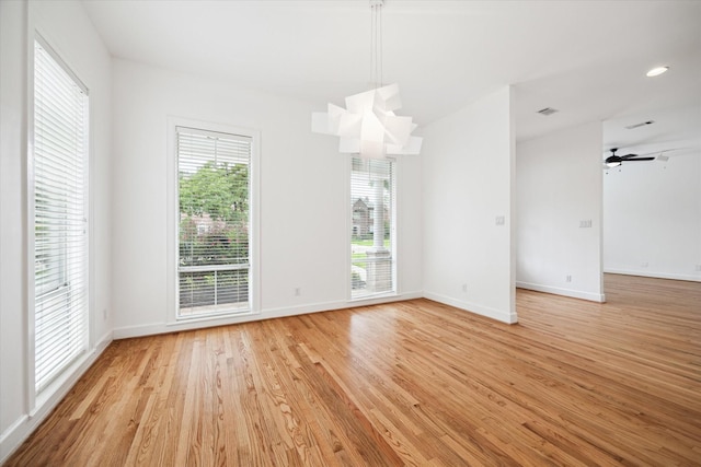 4521 Palmetto St, Bellaire, TX 77401 - unfurnished room featuring light wood-style floors, baseboards, and a ceiling fan