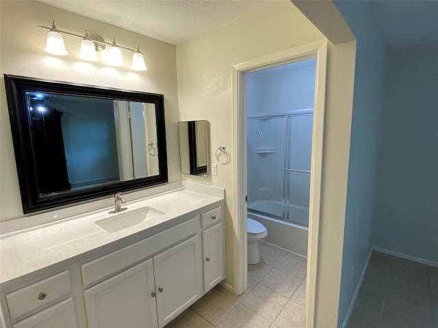 10123 Kent Towne Ln, Sugar Land, TX 77498 - full bath featuring tile patterned flooring, vanity, toilet, and bath / shower combo with glass door