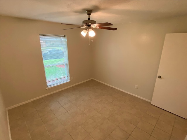 10123 Kent Towne Ln, Sugar Land, TX 77498 - unfurnished room with a ceiling fan and baseboards