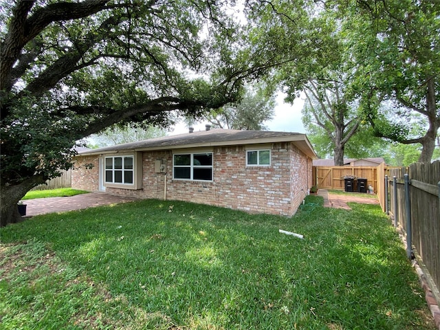 10123 Kent Towne Ln, Sugar Land, TX 77498 - rear view of property with brick siding