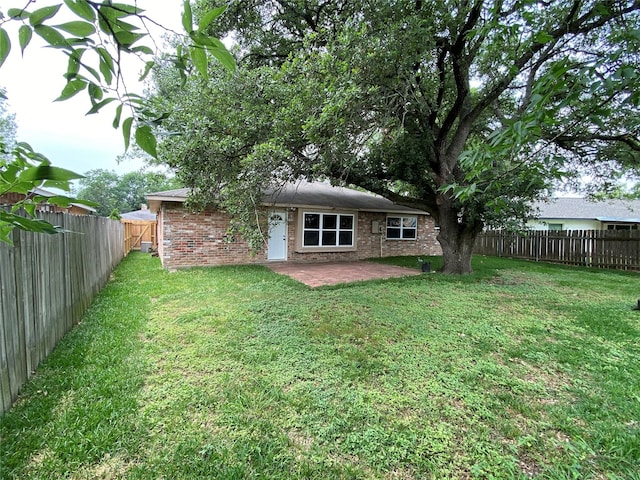 10123 Kent Towne Ln, Sugar Land, TX 77498 - back of house with brick siding and a patio area