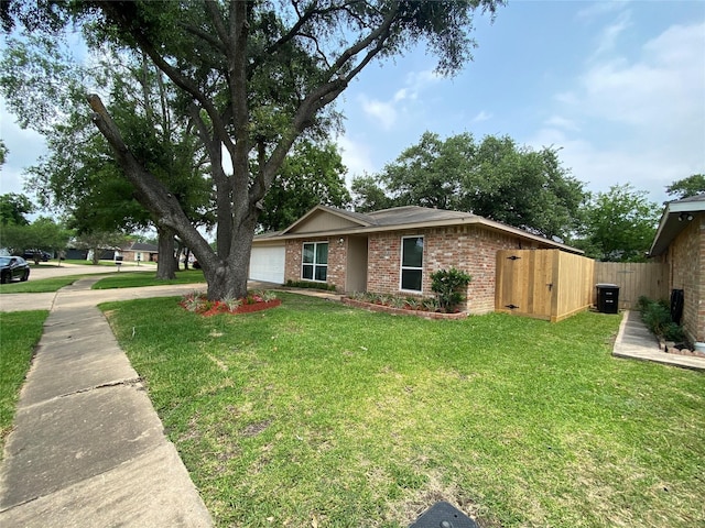 10123 Kent Towne Ln, Sugar Land, TX 77498 - view of front of property featuring a garage, brick siding, and central AC unit