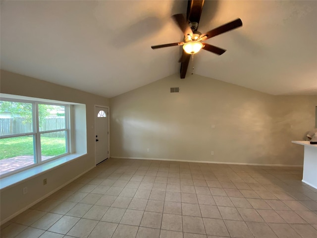 10123 Kent Towne Ln, Sugar Land, TX 77498 - unfurnished living room featuring ceiling fan, light tile patterned floors, and baseboards