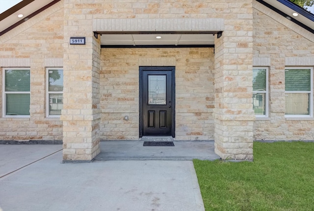 5911 Rietta, Houston, TX 77016 - property entrance featuring stone siding