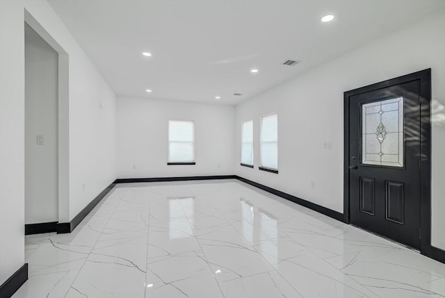 5911 Rietta, Houston, TX 77016 - foyer entrance with recessed lighting and marble finish flooring