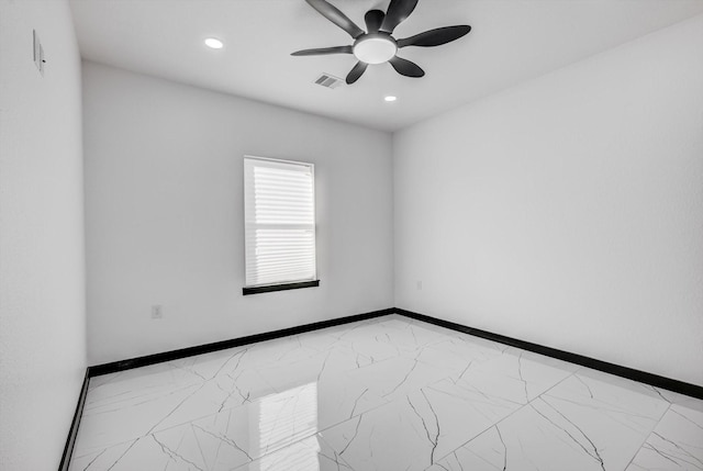 5911 Rietta, Houston, TX 77016 - spare room featuring marble finish flooring, ceiling fan, and recessed lighting
