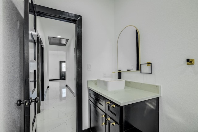 5911 Rietta, Houston, TX 77016 - laundry room featuring attic access and light marble finish flooring