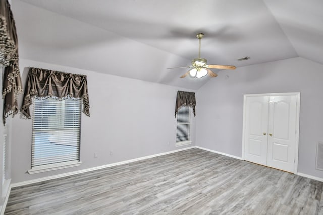 21323 Hannover Frst, Spring, TX 77388 - additional living space featuring vaulted ceiling, wood finished floors, a ceiling fan, and baseboards