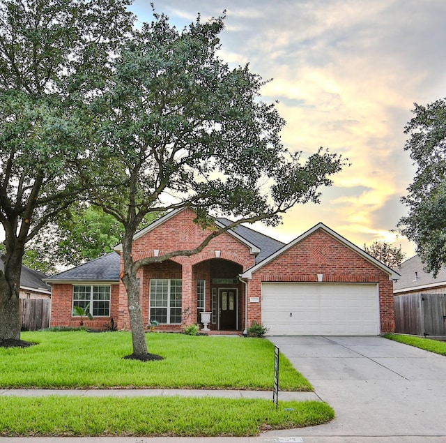 21323 Hannover Frst, Spring, TX 77388 - view of front of property featuring driveway, a garage, and brick siding
