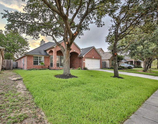 21323 Hannover Frst, Spring, TX 77388 - ranch-style house with brick siding, a chimney, driveway, and a garage
