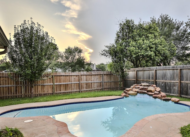 21323 Hannover Frst, Spring, TX 77388 - pool at dusk featuring a fenced backyard