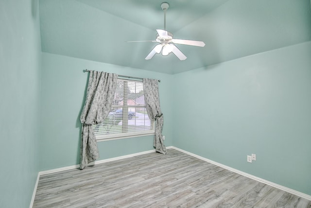 21323 Hannover Frst, Spring, TX 77388 - spare room featuring wood finished floors, baseboards, a ceiling fan, and vaulted ceiling