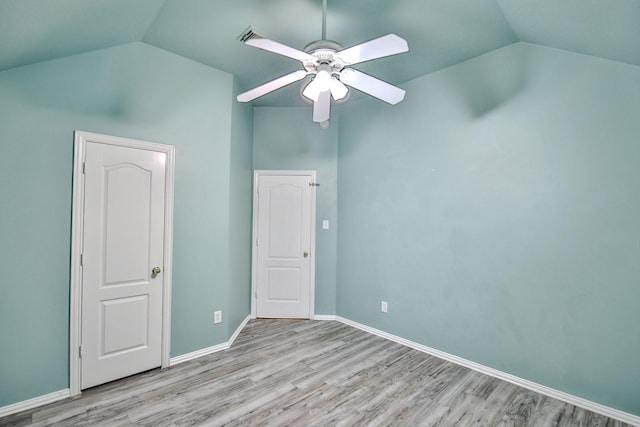 21323 Hannover Frst, Spring, TX 77388 - unfurnished bedroom featuring lofted ceiling, light wood-style flooring, baseboards, and ceiling fan