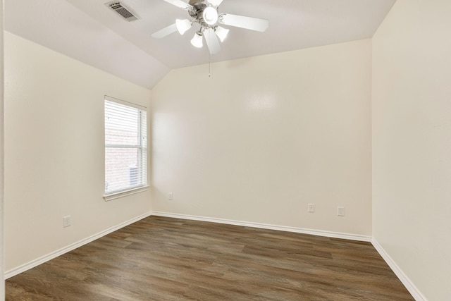 6431 Bright Falls Ln, Katy, TX 77449 - spare room with dark wood finished floors, a ceiling fan, baseboards, and lofted ceiling