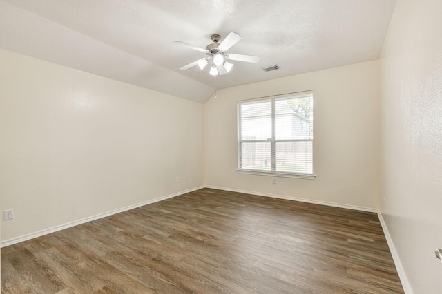6431 Bright Falls Ln, Katy, TX 77449 - unfurnished room featuring wood finished floors, baseboards, ceiling fan, and lofted ceiling