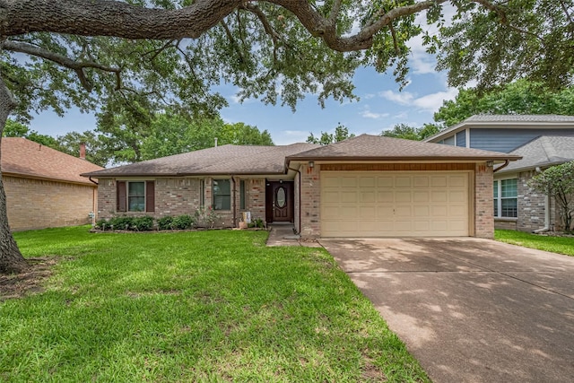 13626 Danbury Run Dr, Houston, TX 77041 - view of front of home featuring an attached garage, concrete driveway, brick siding, a front yard, and roof with shingles