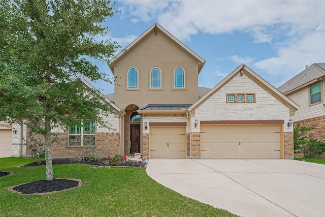 2110 Aztec Thrush Dr, Katy, TX 77494 - view of front of property with driveway, a front lawn, a standing seam roof, and brick siding
