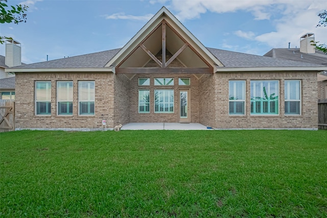 2110 Aztec Thrush Dr, Katy, TX 77494 - back of house featuring a patio area, brick siding, and a shingled roof