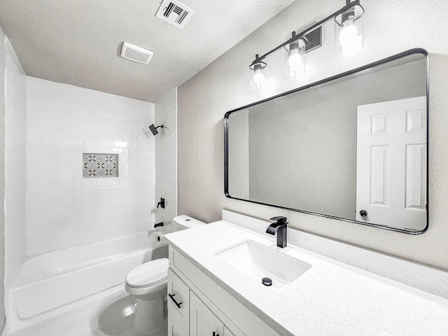 4926 Adonis Dr, Spring, TX 77373 - bathroom featuring toilet, vanity, a textured wall, and washtub / shower combination