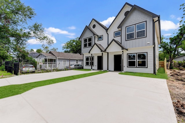 8149 Talton St B, Unit A, Houston, TX 77028 - view of front facade featuring board and batten siding