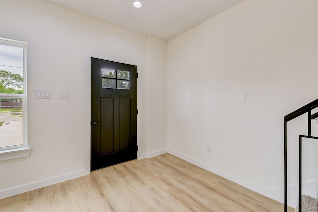 8149 Talton St B, Unit A, Houston, TX 77028 - foyer with light wood-style floors, baseboards, and recessed lighting