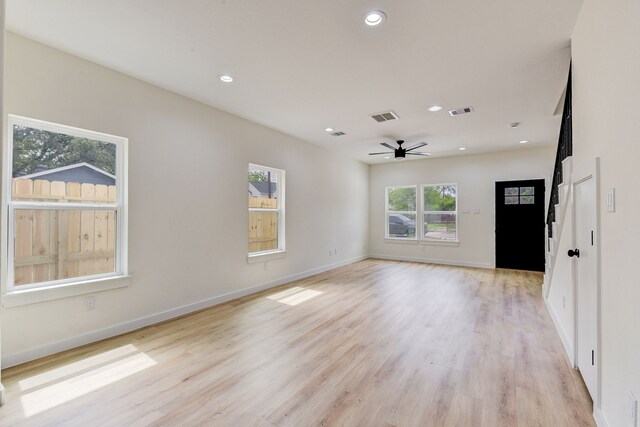 8149 Talton St B, Unit A, Houston, TX 77028 - empty room with ceiling fan, recessed lighting, light wood-style floors, and baseboards