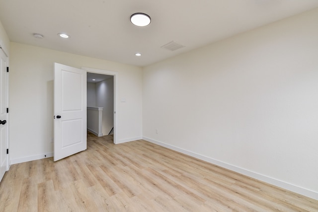 8149 Talton St B, Unit A, Houston, TX 77028 - unfurnished bedroom featuring light wood finished floors, baseboards, and recessed lighting
